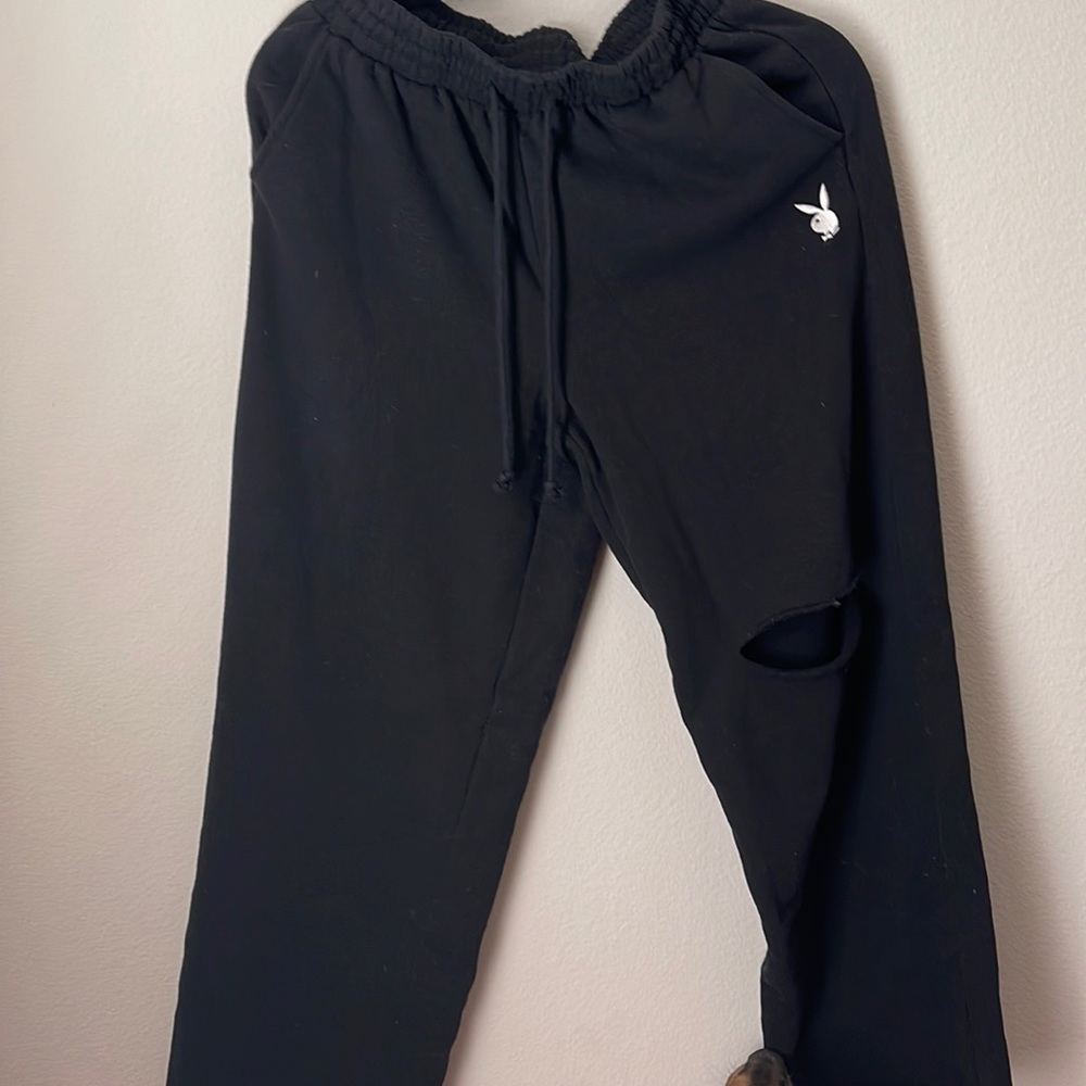 Playboy pants with rips on kneee and on back thigh